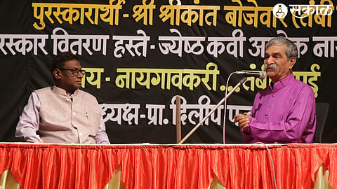 Senior poet Ashok Naigaonkar and senior journalist Shrikant Bojewar chatting in a program organized by Public Library Nashik
