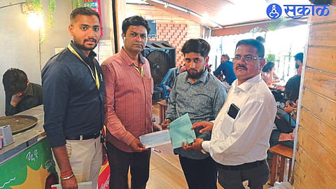 Special team personnel conducting raids on banned plastic sellers in the city.