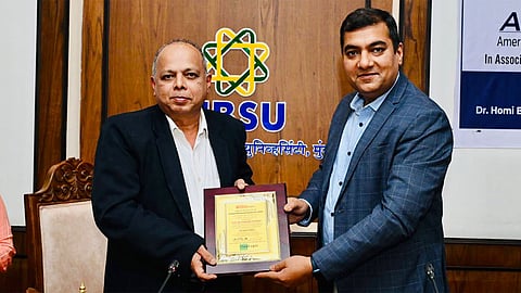 Dr. Rajnish Kamat