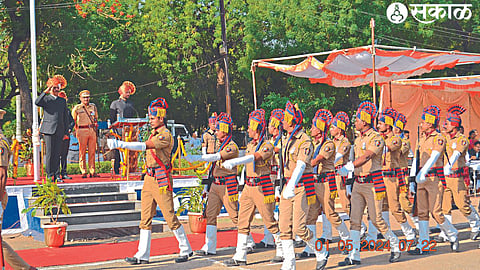 Girish Mahajan saluting the road traffic on the police drill ground on the occasion of Maharashtra Day. Neighbors Abhinav Goyal, Srikanth Dhiware, Vishal Narwade.