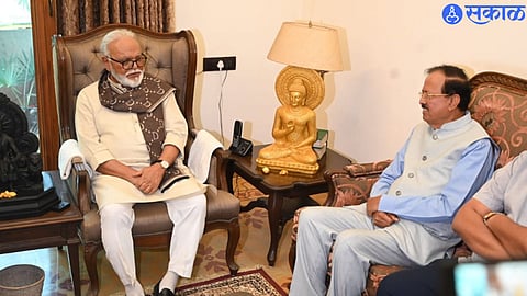Dr. Subhash Bhamre, candidate of the BJP grand alliance in Dhule Lok Sabha constituency, while discussing with the state food and civil supplies minister Chhagan Bhujbal.