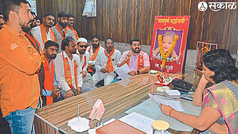 Shiv Sena (Shinde) protestor while complaining to Deputy Commissioner