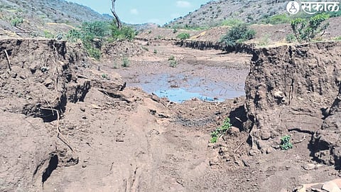 The dam built by the forest department and the first to burst in rain.
