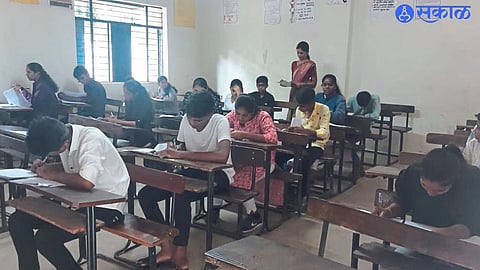Students present at the examination center at Vainteya Vidyalaya on Sunday.
