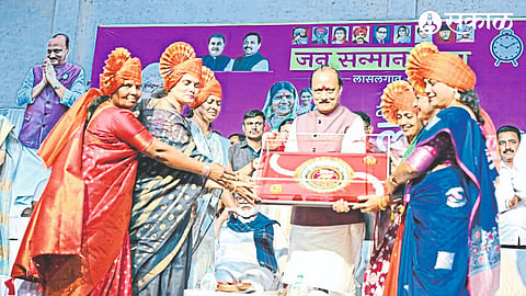 Women presenting a silver rakhi to Deputy Chief Minister Ajit Pawar, who came on the occasion of Jansanman Yatra organized by Nationalist Congress Party.