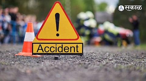 Accident scene near Theur Phata in Pune where a dumper collided with a car, leading to the death of a father and son.