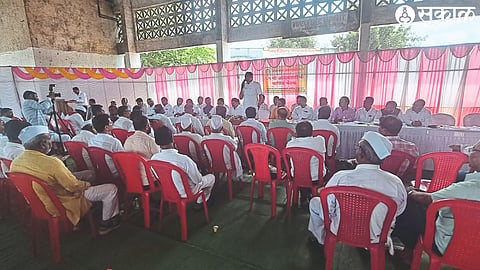 Devidas Pingle, Chairman of Nashik Market Committee, speaking at the Annual General Meeting of Shetthi Taluka Sangh held on Sunday in the Sale Hall of Sharad Chandra Pawar Market Yard.