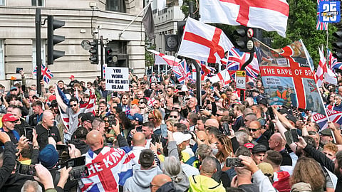 Clashes erupt between police and right-wing protesters during anti-immigrant march in Britain.