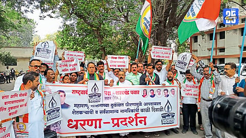 NCP activists, led by Anil Deshmukh, stage dharna at district collector office in Maharashtra demanding full loan waiver for farmers.