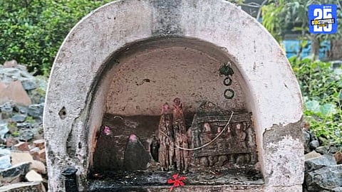 Local youth inspecting the ancient samadhi and stone inscription discovered at Rethare village in Karad taluka.