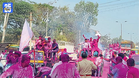 BJP supporters celebrate a landslide victory after Kupwad municipal election results.