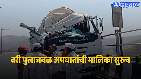 A damaged car and container truck seen after a chain accident near Jambhulwadi Bridge close to Katraj Tunnel on the Pune Satara Highway.