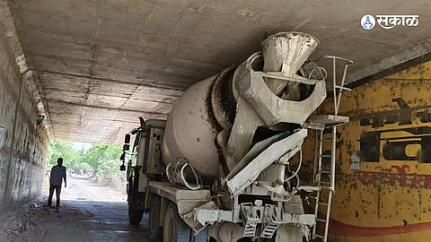 Infrastructure Flaw: Cement Mixer Truck Trapped Under Rajapur Flyover