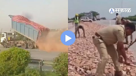 Dumper truck seen dumping construction stones on Expressway 