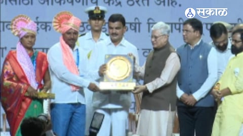 Progressive farmer Govardhan Ugle received the Maharashtra Krushibhushan Award for outstanding achievements in organic farming.