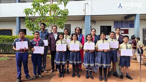 Students of New English Medium School, Ghodegaon, secured a 100% result in the Gandharva Mahavidyalaya music examination.