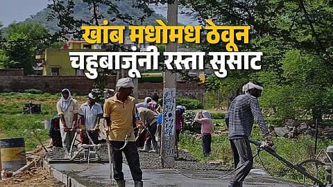 Electric poles in middle of road