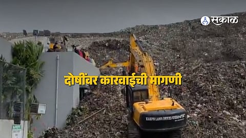 Rescue teams clearing debris after a massive garbage heap collapsed