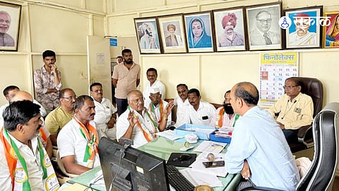 NCP (Sharad Pawar) workers staged a sit-in protest at the Mahavitaran office in Satana against the installation of smart meters without consumers' consent.