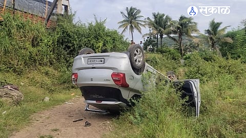 A Swift car fell into a 20-foot ditch near Railway Gate No. 96 at North Koparde after losing control at an S-shaped turn; all five occupants survived safely.