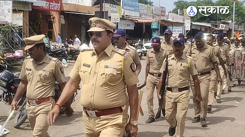 Mohol Police conduct a route march across the city and Shetphal ahead of Ganeshotsav to maintain law and order.