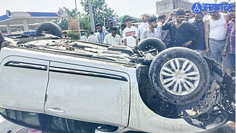A car overturned after crashing into a solar-powered pole in Deulgaon Raja, leaving a 21-year-old woman dead and three others injured.
