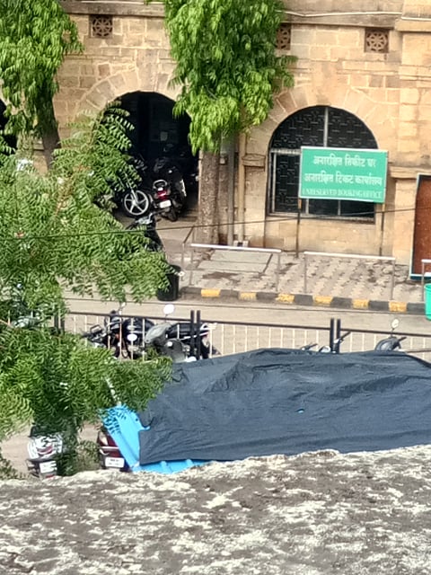 Queue of vehicles at ticket counter