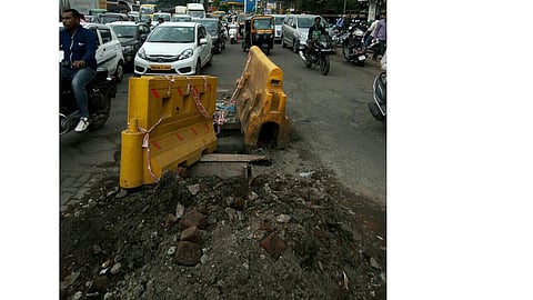 Big-pit-on-road