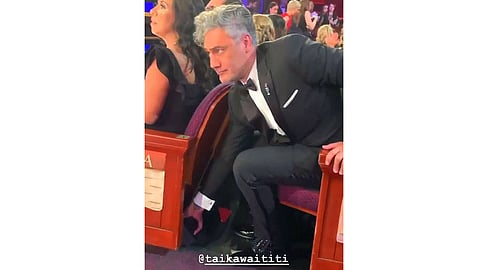 Actress Brie Larson catches filmmaker Taika Waititi hilariously stashing his Oscars trophy under the seat
