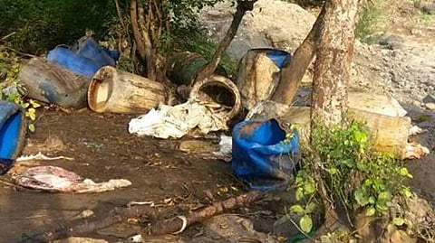 police raid on liquor kilns