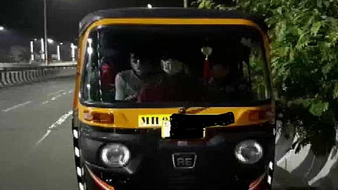 migrant rickshaw.jpg