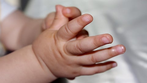mother leaves her baby