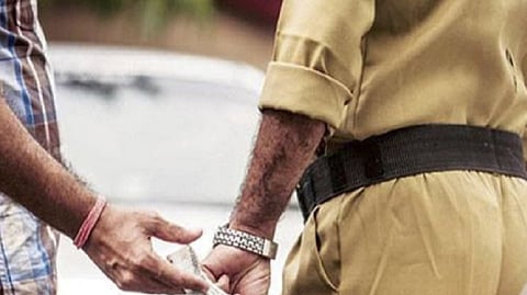Police taking bribe