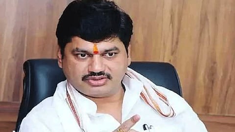 bjp leader chandrakant patil demands dhananjay munde rejection