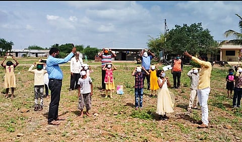 Experiment of showing solar eclipse to students and parents in four villages