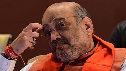 home minister amit shah after delhi election result desh ke gaddaron statement