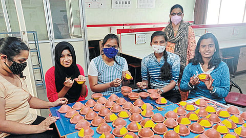 Solar powered lamps made by DKTE students
