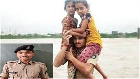 People salute to police constable who work hard in flood morbi