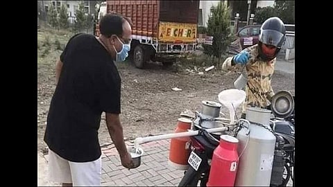 coronavirus lockdown milk man delivers milk unique way photo goes viral