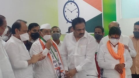 Former District Bank Chairman Sitaram Gaikar a senior co operative leader from Ahmednagar district joined the NCP along with his colleagues.jpg
