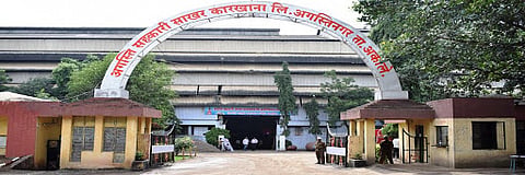 Agusti factory workers rush to work