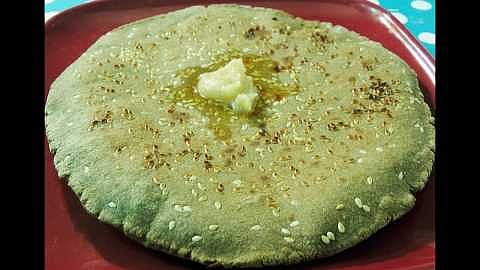 Beginning to make millet bread from the women of Self Help Group