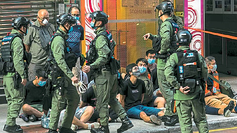 Hong Kong police arrest ninety protesters
