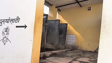 The toilet at the bus stand in Kharsundi is in a pit of filth
