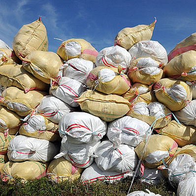 Philippines (June 30, 2008) 100-pound sacks of rice stacked before being loaded into U.S. Navy helicopters
Photo: U.S. Navy