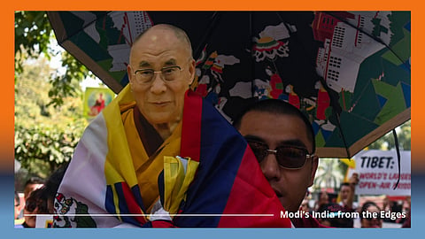 A Tibetan monk holds a picture of the Dalai Lama at a 2024 event in Delhi to mark the 65th anniversary of the 1959 Tibetan uprising. India appears to adopt multiple policies on Tibet and Tibetans – some proactive, others not. Photo: IMAGO/Zuma Wire
