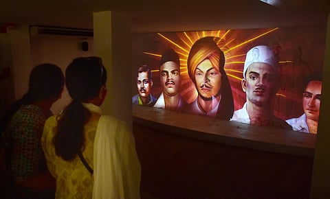 Visitors inside the Jallianwala Bagh memorial after its reopening on August 2021 in Amritsar, India. (This featured image was added online in 2024, and did not appear in the original print publication.)