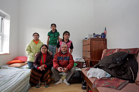 The Kuikel family, ethnic Nepali refugees from Bhutan, in their house in southern Philadelphia, in the United States, where they resettled after fleeing Bhutan in 1992.