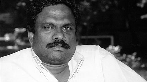 Black and white photo of Taraki Sivaram. Dharmaretnam Sivaram was known for his column on politics in northern Sri Lanka. He was abducted and killed in 2005.