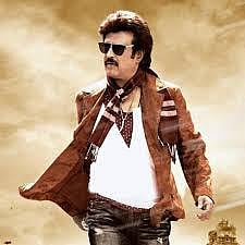 வேனில் லிங்கா படம் ஒளிபரப்பிய ஓட்டுநர் கைது